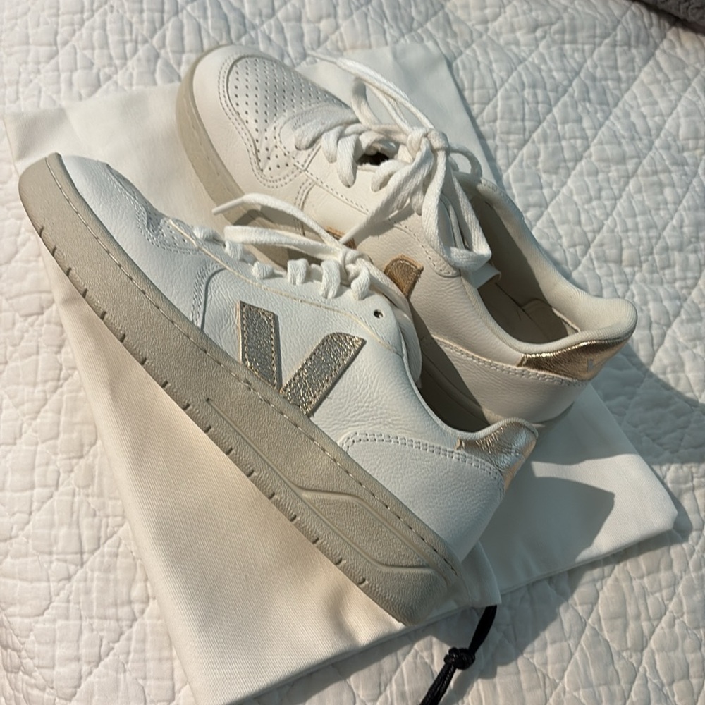 Veja Women's White and Gold Sneakers